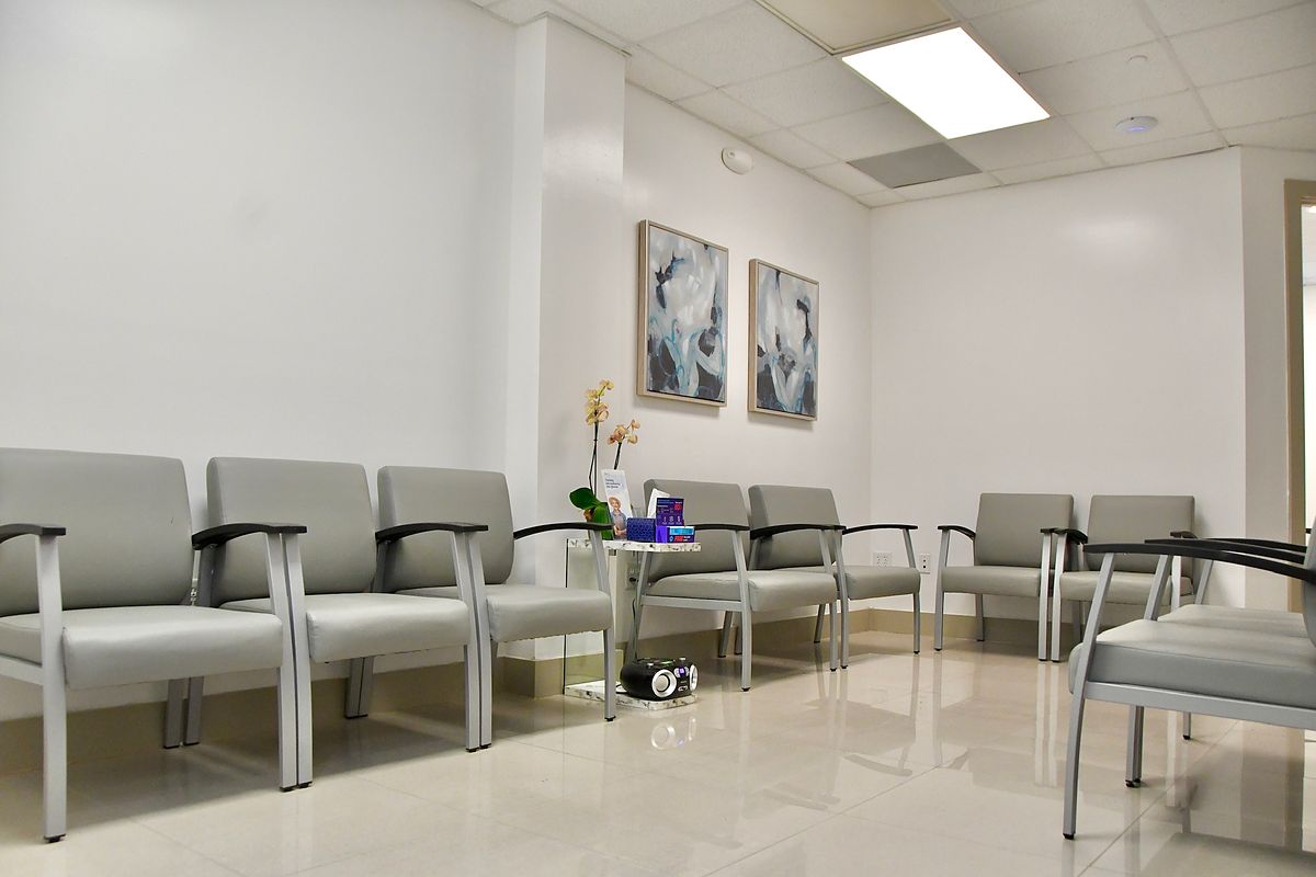 Bright, modern waiting room at Davie ObGyn